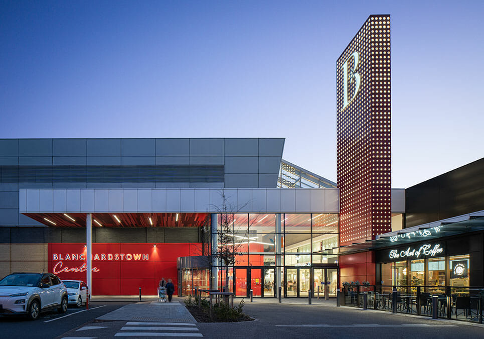 Blanchardstown Shopping Centre entrance and tower at dusk, Dublin