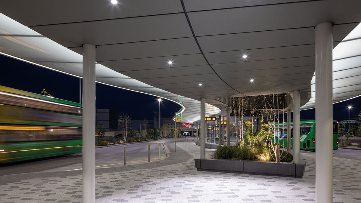Liffey Valley Bus Connect Plaza canopy and seating at dusk, Dublin